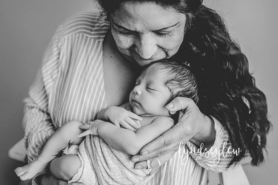 family photographer top newborn and grandmother portrait; northern colorado family and newborn photography
