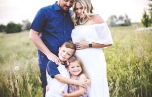 Fort Collins, Colorado Newborn Baby Photographer maternity photo in field